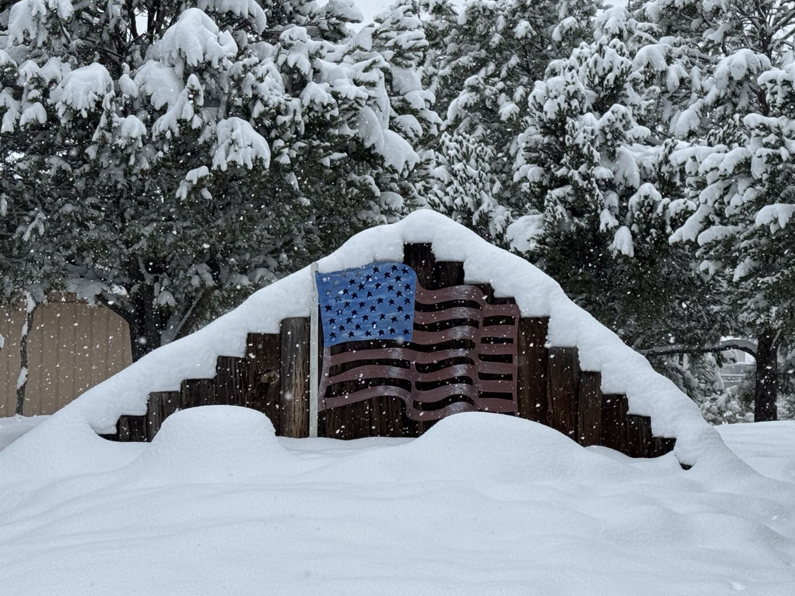 A house covered in snowDescription automatically generated